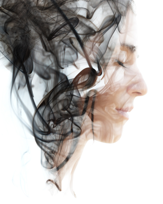 A woman deeply relaxed during a hypnotherapy session